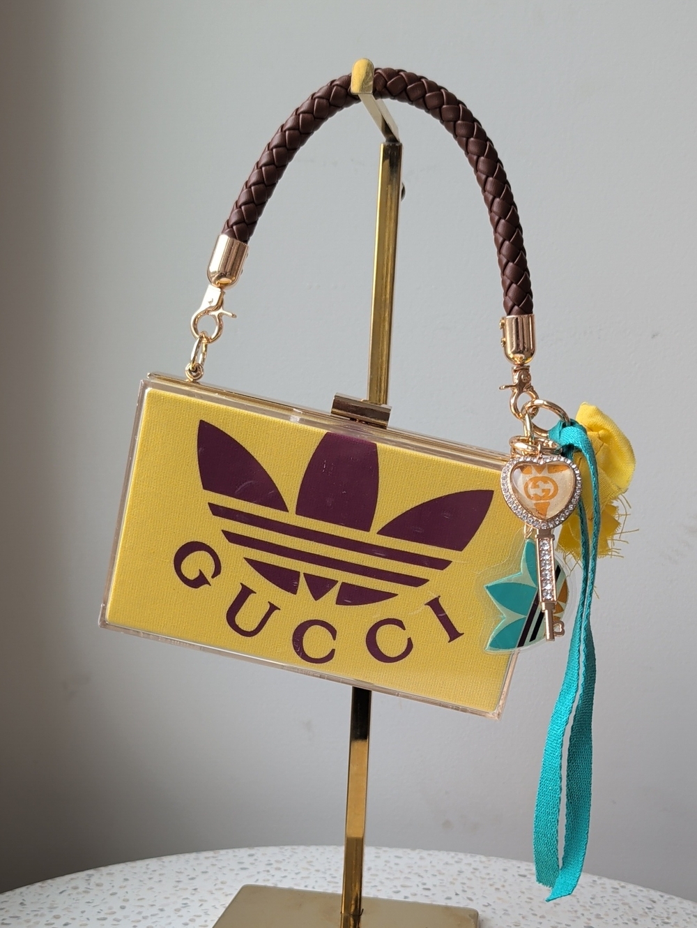 Upcycled Yellow Acrylic Box Bag with Brown Braided Handle and Maroon Logo